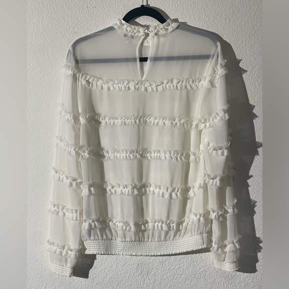 Guess Mock Neck Ruffled Woven Shirt
Style # W64H53W4S42 - Picture 2 of 5